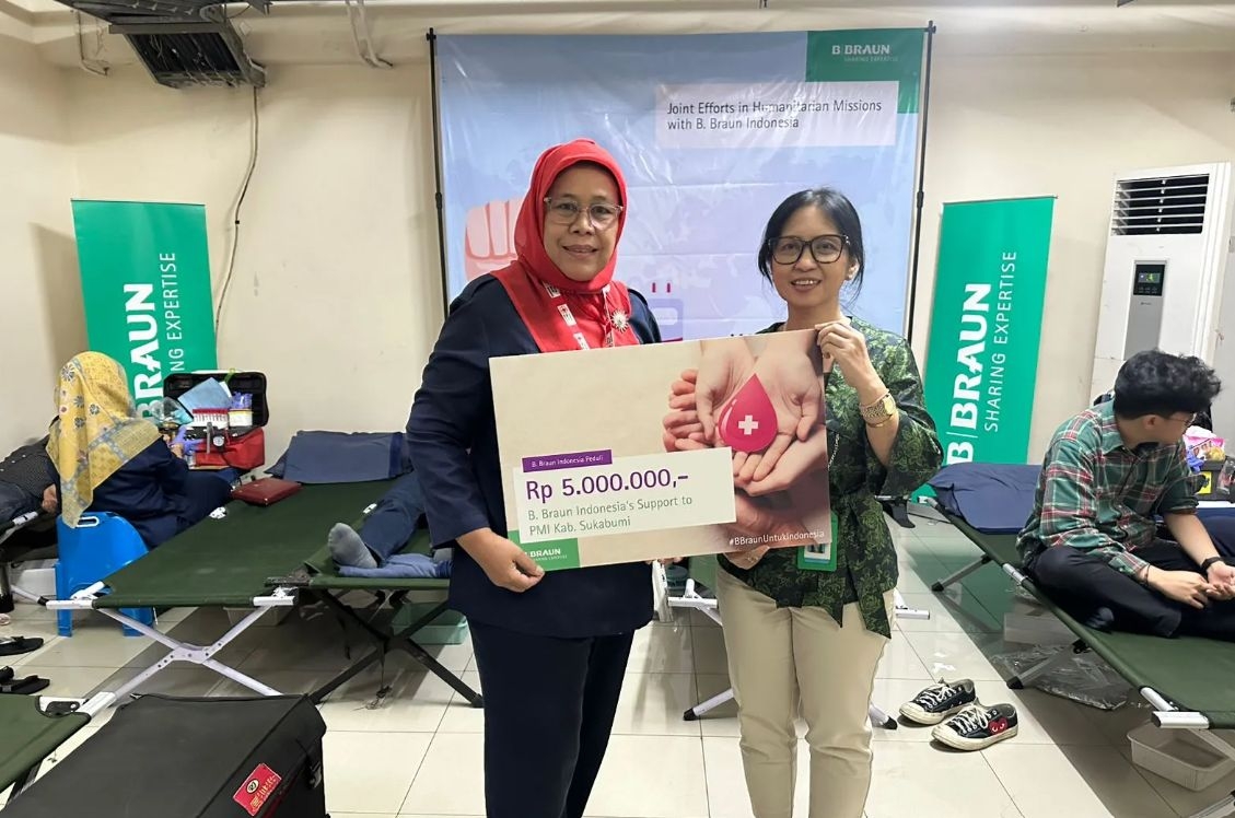 Anna Maria Braun presenting annual report conference titled empowered by technology