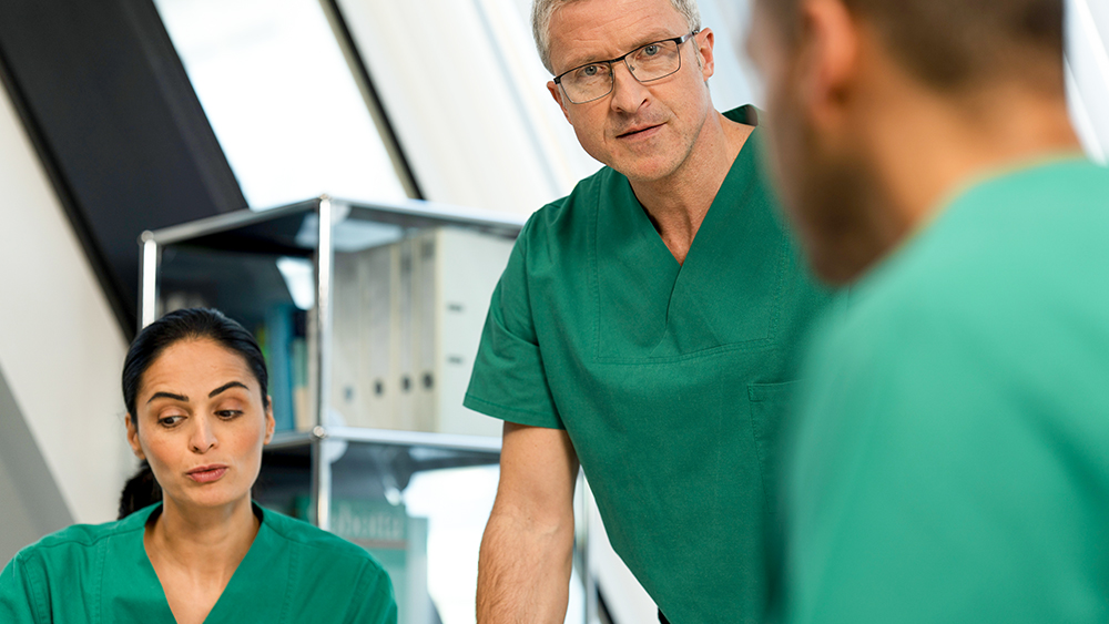 portrait of a middle-aged male health care specialist with the glasses